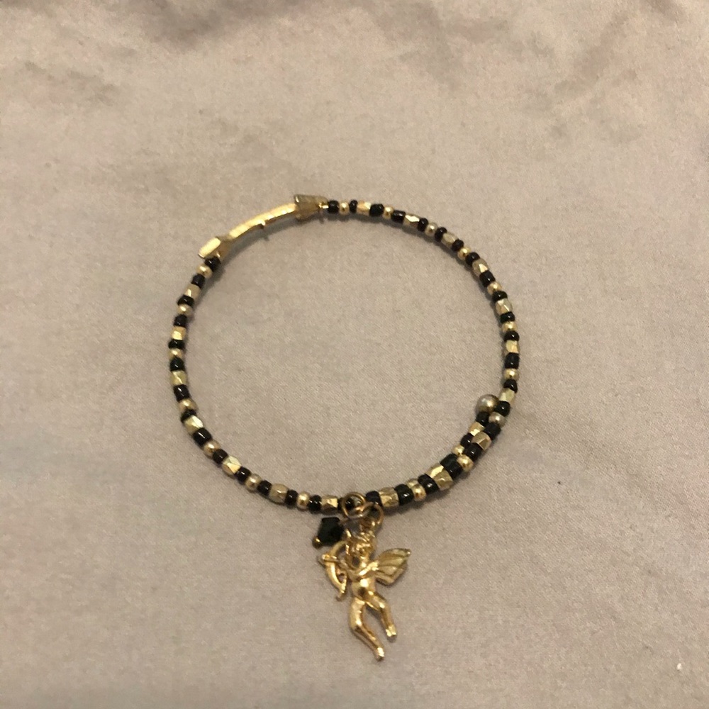 Cute black/gold bead bangle with Cupid and arrow!